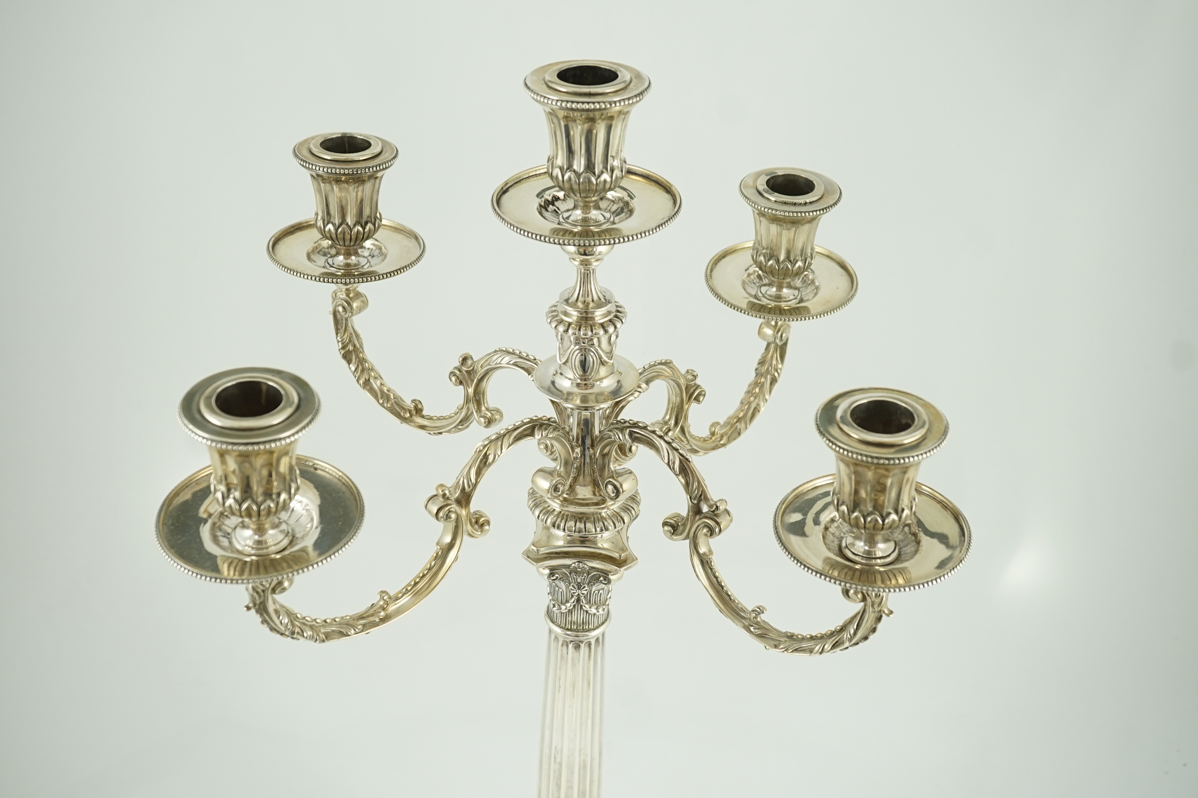 A good Victorian silver four branch, five light candelabrum, by R & S Garrard & Co